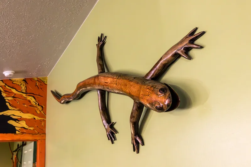 Carved wood salamander sculpture